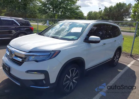 2022 Honda Pilot Awd Touring 7 Passenger from USA, damaged, VIN 5FNYF6H60NB060737